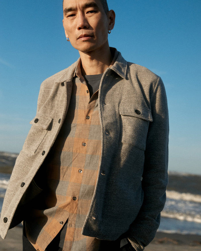 Model wears the Pickwick Shirt at a beach in Charleston, SC.