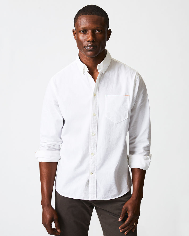 Male model wears the MSL 1 Pocket Shirt in White