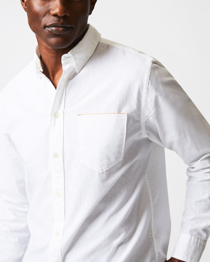 Male model wears the MSL 1 Pocket Shirt in White